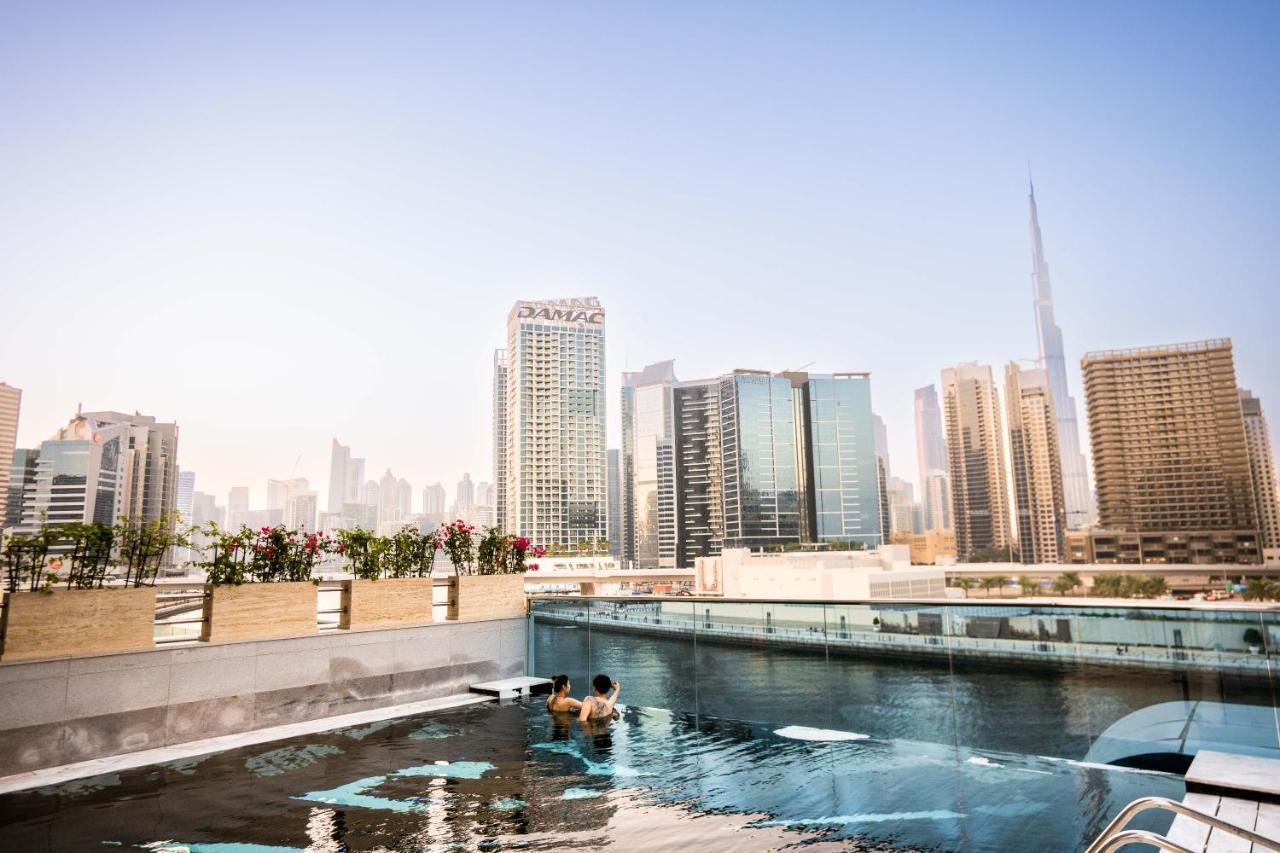 Hyde Hotel دبي المظهر الخارجي الصورة View of the Dubai skyline from the rooftop pool at the Address